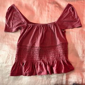 Two off the shoulder shirts